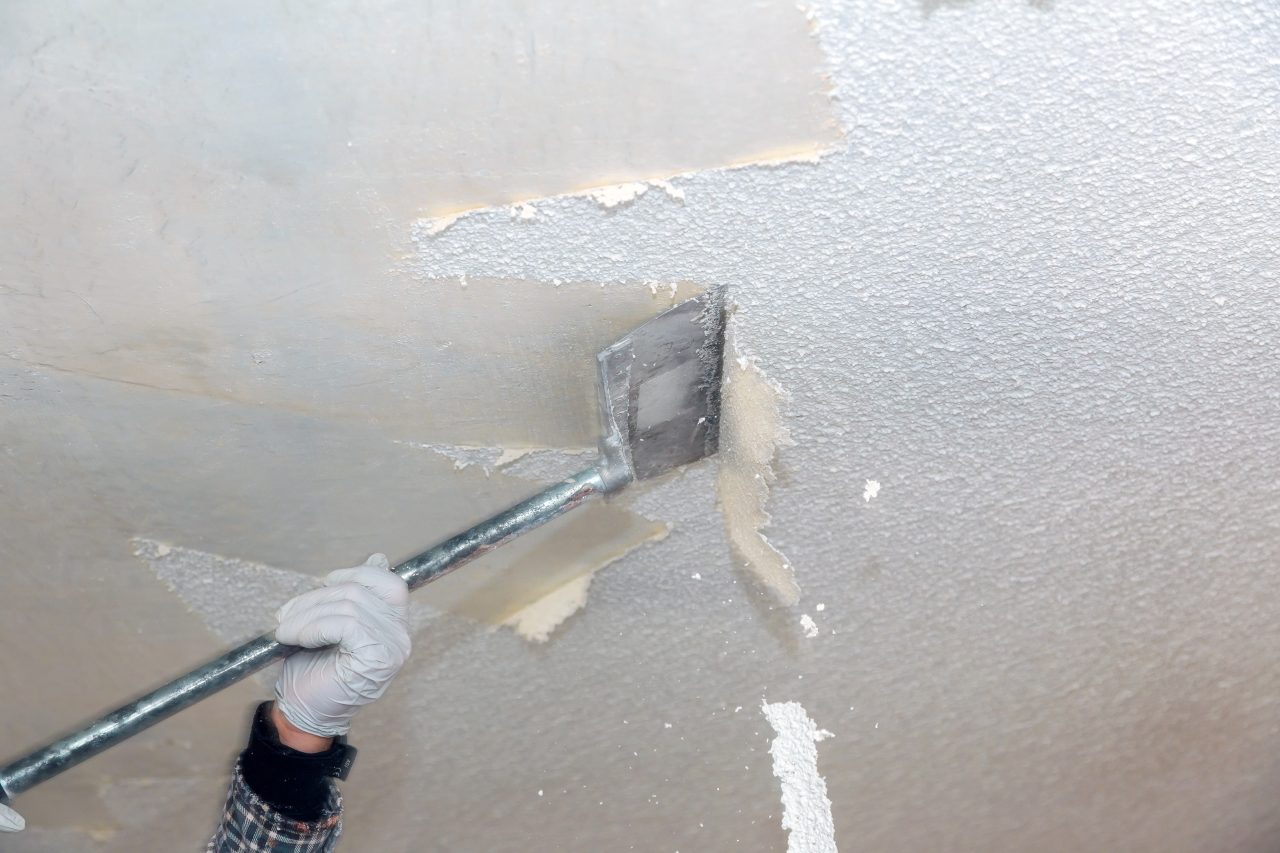 take-off-in-the-popcorn-ceiling-home-wall-texture-removal-ceiling-drywall-demolition-e1698216495143.jpg